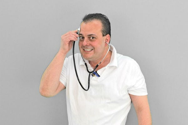 doctor putting stethoscope on his head