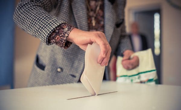 image of someone posting ballot paper the positive psychology people blog politics