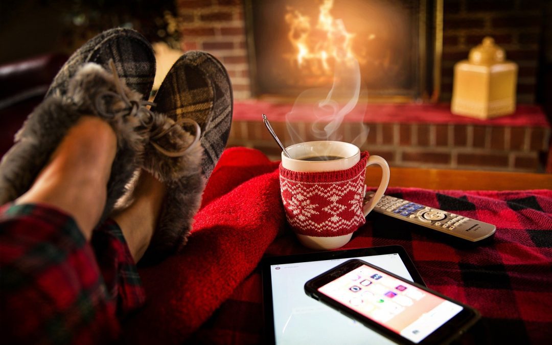 cosy slippers and hot drink by an open fire blog for the positive psychology people