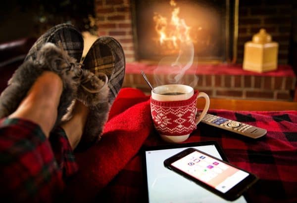 cosy slippers and hot drink by an open fire blog for the positive psychology people