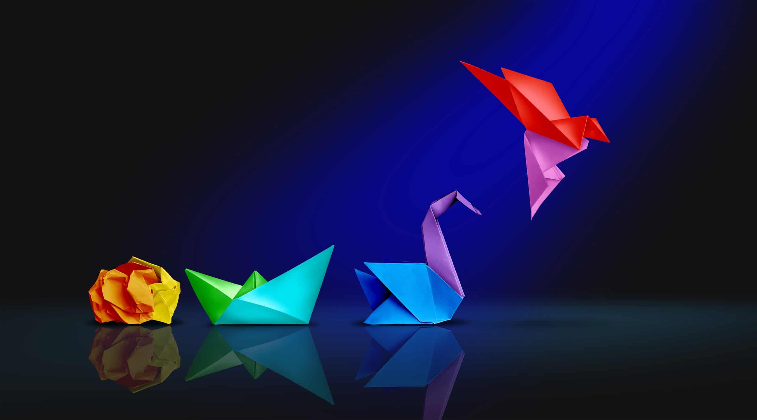progression of paper cranes from screwed up ball to fully formed used to represent the Disney Creative Planning Strategy